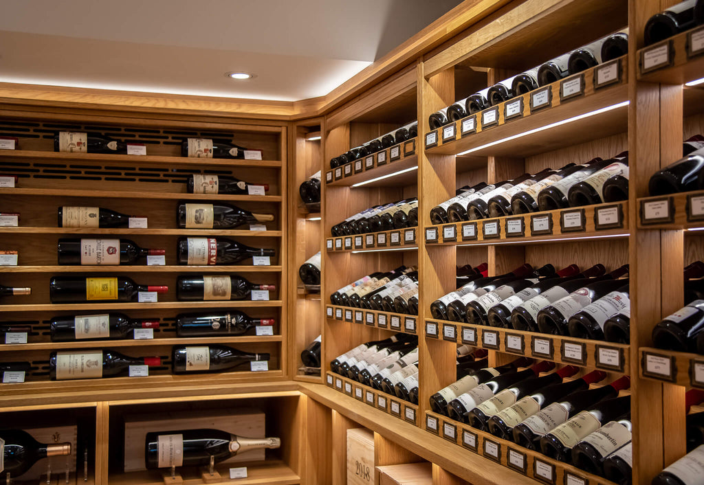 Wine cellar design with angled shelving and temperature control