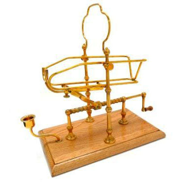 A traditional style wine decanting cradle