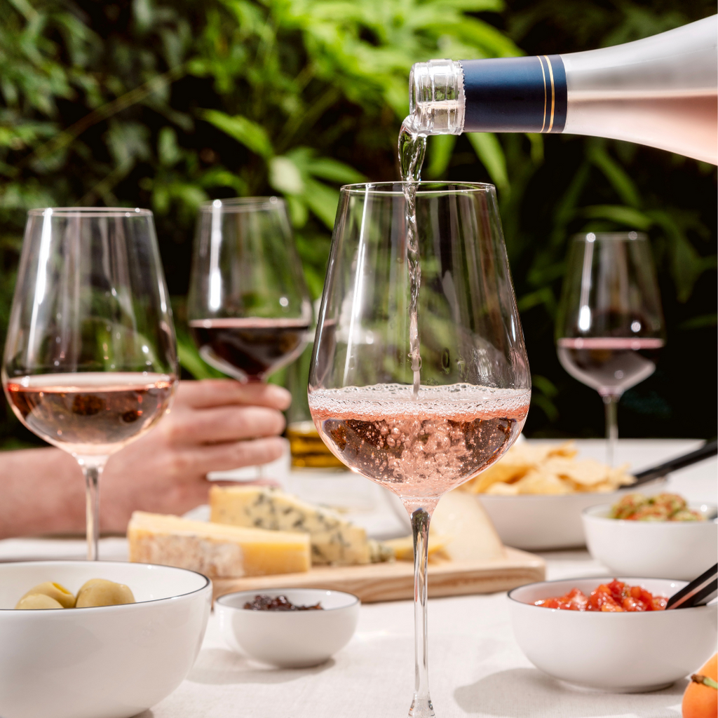 An image of wine being poured into a Richard Brenon and Jancis Robinson Precision Wine Glass.