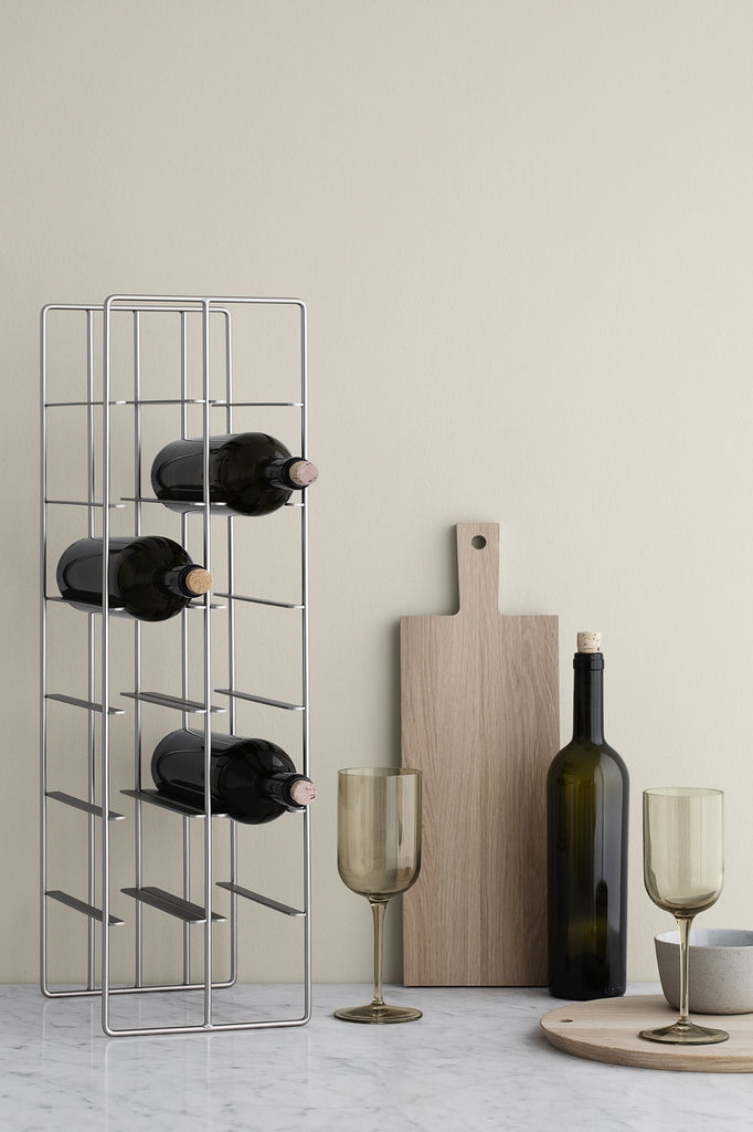 A lifestyle image of the Blomus metal wine rack