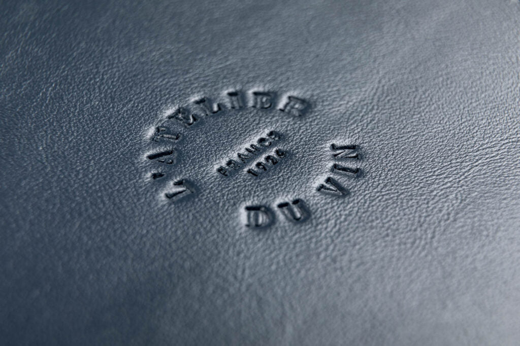 L'Atelier Du Vin logo in leather case